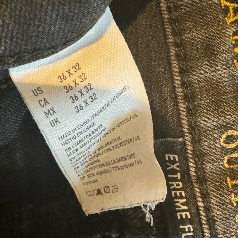 AMERICAN EAGLE Extreme Flex 4 Slim Jeans Black Ripped